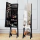 Full-size mirror jewelry cabinet in black with LED lights, showcasing interior storage for lipsticks and jewelry.
