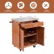 Wooden kitchen rolling storage cabinet with stainless steel top, featuring a drawer, shelves, and four casters for.