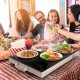 Electric warming tray with adjustable temperature, featuring a glass top and stainless steel design, perfect for.