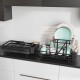 2-tier collapsible dish rack in black with removable drip tray, holding plates and bowls for efficient kitchen drying.