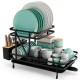 2-tier collapsible dish rack in black with removable drip tray, holding plates, bowls, cups, and cutlery for kitchen.