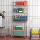 Stainless steel overshelf with adjustable lower shelf, featuring storage for kitchen supplies in a restaurant setting.