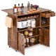Rolling kitchen island cart in rustic brown with drop leaf, wine rack, and storage for versatile dining and serving.
