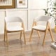 Set of 2 soft padded accent armchairs in natural and beige, featuring a durable rubber wood frame for dining room use.