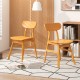 Set of 2 modern dining chairs with curved backrest, natural rubber wood frame, perfect for kitchen or dining room use.