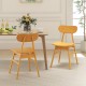 Single modern dining chair with a curved backrest in natural rubber wood, offering stylish support for various home.