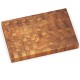 End grain cutting board made of solid teak wood, featuring hand grips for versatile kitchen tasks and a knife-friendly.