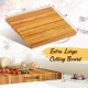 Extra large 24" teak wood cutting board with handles, reversible design for versatile kitchen use and easy serving.