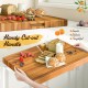 Extra large 24" teak wood cutting board with handy cut-out handle, ideal for serving and multi-purpose kitchen use.