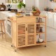 Kitchen island cart on wheels with bamboo frame, featuring storage drawer, cabinet, and shelves for versatile kitchen.