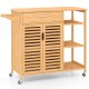 Bamboo kitchen island cart on wheels with drawer, cabinet, and shelves for versatile storage in any room.
