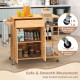 Kitchen island cart on wheels with bamboo frame, spacious storage, and lockable wheels for safety and convenience.
