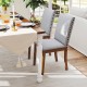 Set of 2 upholstered dining chairs with padded seat and walnut frame, featuring decorative nailhead trim for elegance.