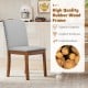 Upholstered dining chair with padded seat, walnut rubber wood frame, and elegant nailhead trim for stylish dining.