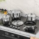 7-piece stainless steel cookware set on a stove, featuring pots and a non-stick fry pan with tempered glass lids.