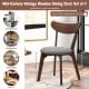 Upholstered dining chair with curved back, rubber wood legs, ideal for dining room or kitchen, ergonomic design.