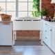 Stainless steel utility sink with three compartments, adjustable legs, and high backsplash, ideal for commercial.
