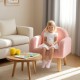 Kids armchair in soft pink teddy fleece, featuring sturdy wood-like legs, ideal for cozy reading nooks and play areas.