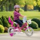 Kids bike with 12-inch wheels, training wheels, and dual brake system, perfect for 3-4 years old, shown in a park.