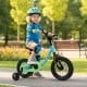 Kids bike in blue with training wheels, ergonomic seat, and dual brake system, perfect for outdoor fun and safety.