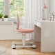 Kids desk chair in pink with adjustable height and dual back support, perfect for studying and writing.