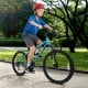 Kids mountain bike in blue with 20-inch tires, adjustable saddle, and dual V-brakes for safe riding on various terrains.