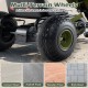 Multi-terrain wheels of the green kids pedal go-kart, designed for various surfaces like asphalt and gravel.