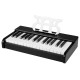 Kids piano keyboard with 30 keys, black finish, music stand, designed for beginners aged 3+, promotes musical skills.