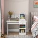 Kids study desk in white with hutch, drawer, and shelves, ideal for children's bedrooms or study spaces.
