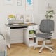 Kids study desk in gray with hutch, drawer, and shelves for ample storage and safety features, ideal for children's use.