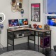 L-shaped computer desk in gray with charging station, adjustable shelf, and heavy-duty metal frame for home office use.