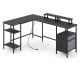 L-shaped black desk with power outlet, adjustable shelves, and monitor stands for versatile office use.
