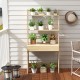 Ladder shelf desk with natural finish, featuring a countertop, drawer, and 2 shelves for versatile storage solutions.