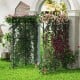 Large garden arch trellis in black, featuring climbing plants and flowers, ideal for outdoor patios and garden.