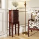 Walnut jewelry cabinet with five drawers and a mirror, perfect for organizing all types of jewelry in style.