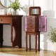Walnut jewelry cabinet showcasing five drawers and a mirror, perfect for stylish and organized jewelry storage.