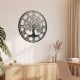 Large 27-inch black metal wall clock featuring a tree of life design, ideal for stylish home decor.