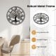 Large 27-inch black metal wall clock with a tree of life design, featuring a robust frame and smooth edges for easy.