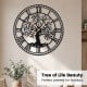 Large 27-inch black metal wall clock featuring a tree of life design, perfect for holiday gifting and home decoration.