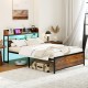 Close-up of the LED bed frame's storage headboard showcasing open shelves and built-in power outlets for convenience.