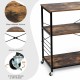 Rolling industrial kitchen baker's storage shelf with 3-tier engineered wood, metal frame, and 360° swivel wheels for.