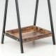 Bottom shelf of the lockable jewelry organizer with a rustic wood finish, designed for extra storage and stability.