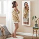 Lockable wall-mounted jewelry cabinet with LED lights and full-length mirror, made of durable MDF for elegant storage.