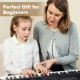 61-key portable electronic keyboard piano with stand and stool, ideal for beginners, featuring light-up keys and.