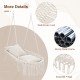 Macrame swing chair with beige removable cushions, sturdy metal frame, and chic bohemian fringes for indoor or outdoor.