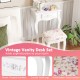 Vintage vanity desk set featuring a floral pattern seat cushion, curved legs, and flower-shaped handles for elegant.