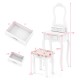 Cushioned stool with floral pattern and curved legs, designed to complement the white makeup dressing table for girls.