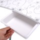 Foldable portable manicure table with white floral design, featuring a durable drawer and comfy wrist cushion for nail.