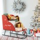 Red metal Christmas Santa sleigh basket filled with gifts, perfect for festive storage and holiday decor.