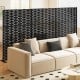 Freestanding black metal privacy screen, 72 x 48 inches, featuring a hollowed design for ventilation and stability.